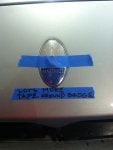 1 Place lots of tape around edge of badge.jpg